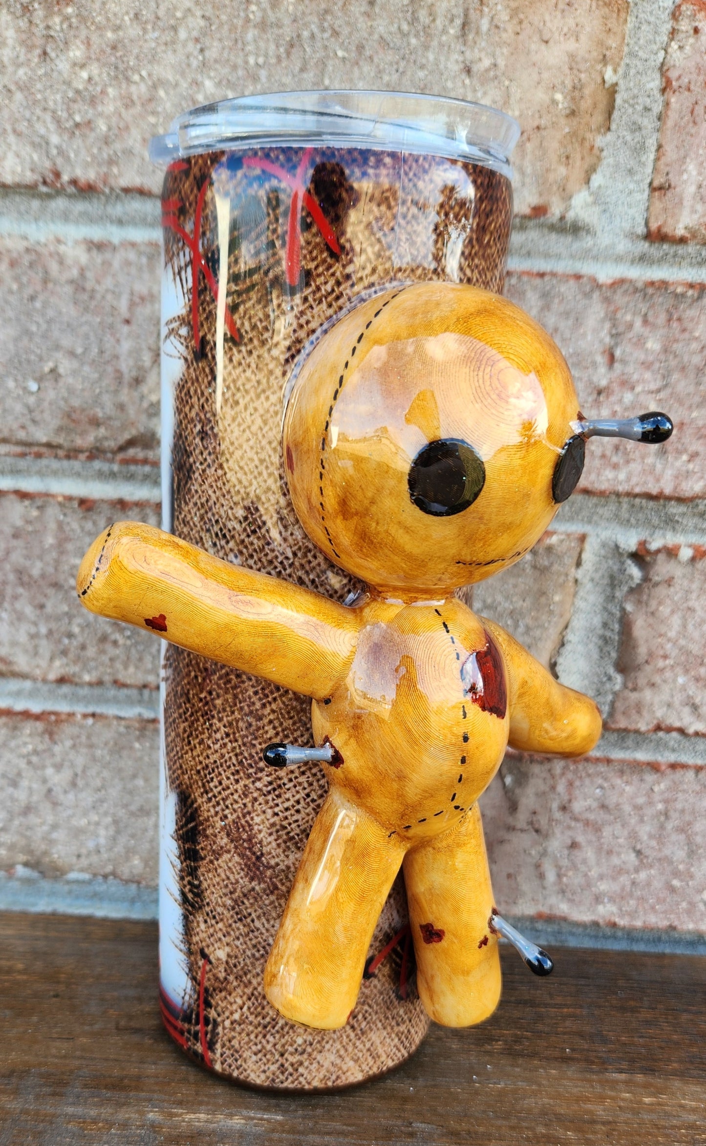 Finsihed voodoo doll tumbler
